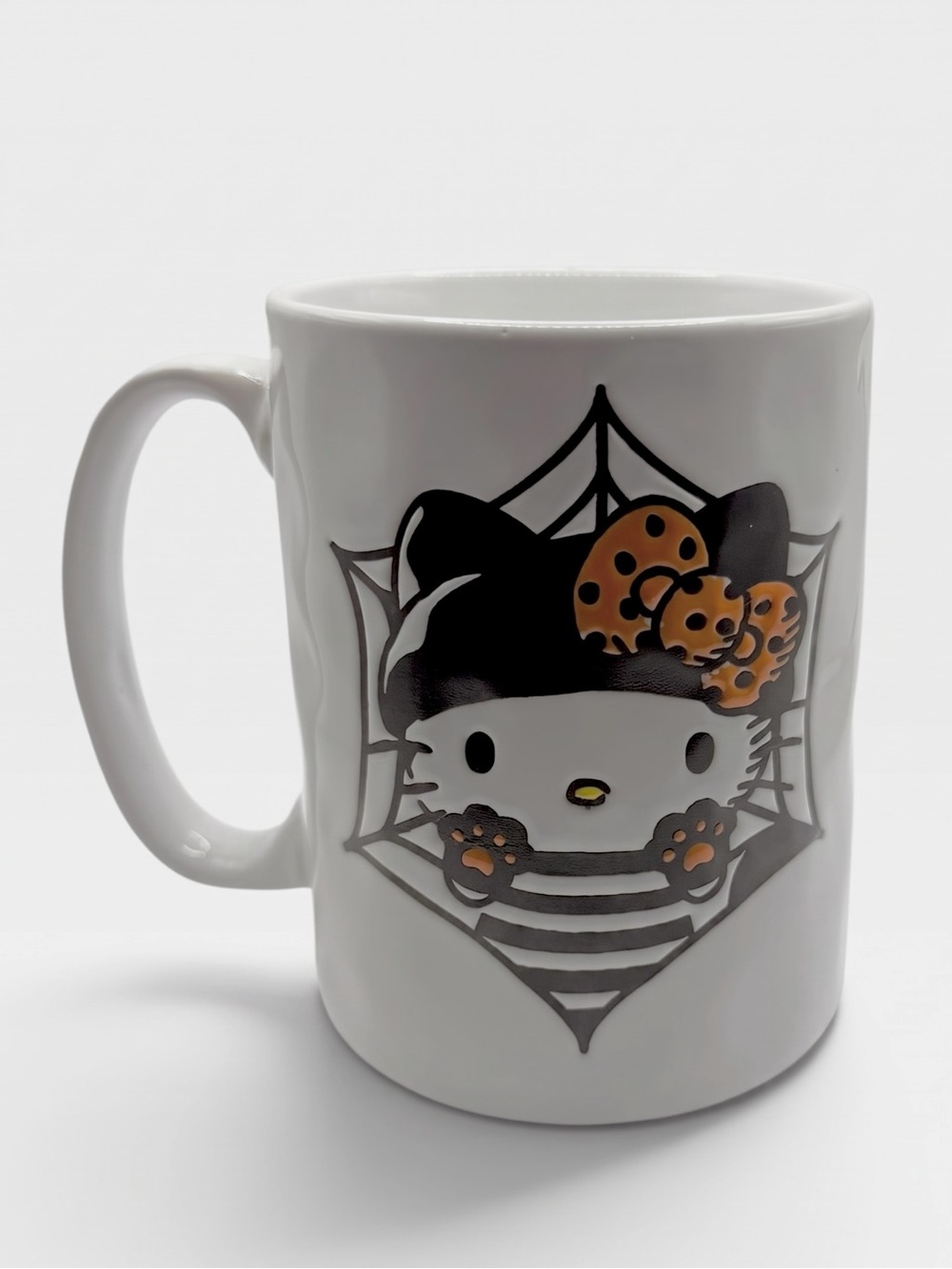 Silver Buffalo Sanrio Hello Kitty Halloween “Cat Burglar” Ceramic Mug – 17 oz